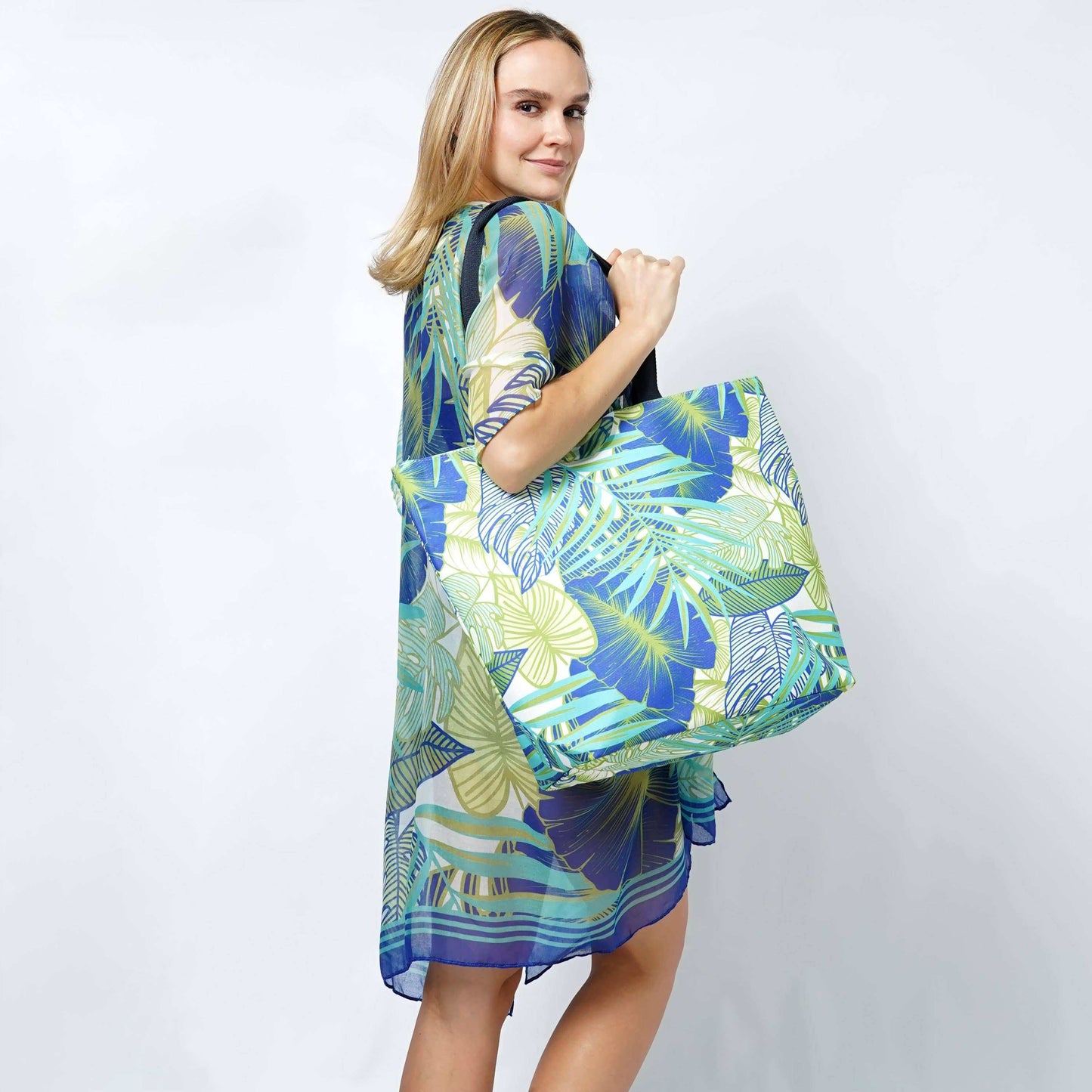 Tropical Leaves Print Summer Tote BagTropical Leaves Print Tote Bag 

- Zipper Closure
- One Small Zipped Pocket Inside
- Size: 15.25" L x 19" W (5.5" Wide Bottom)
- 100% Polyester

**Light Weight, PerfTropical Leaves Print Summer Tote BagFashion CityScrub Angel & Accessories 