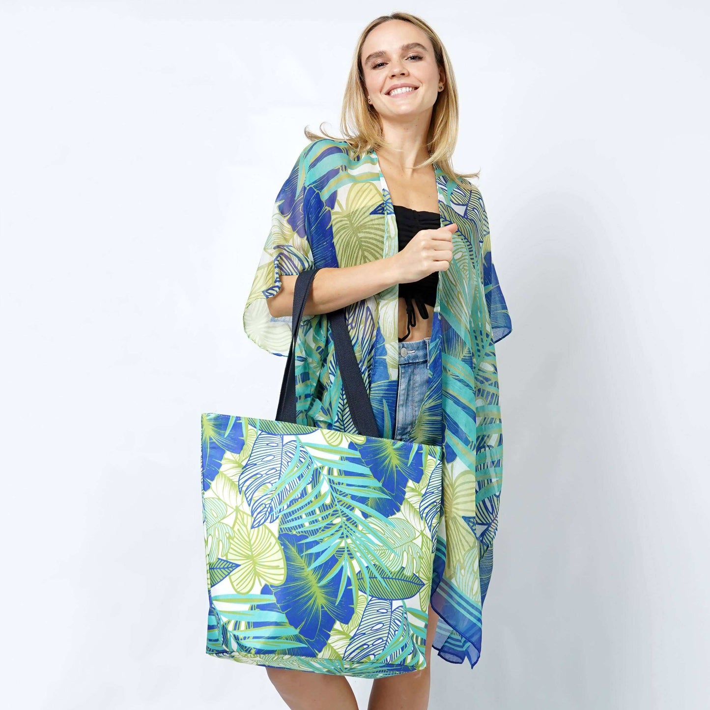 Tropical Leaves Print Summer Tote BagTropical Leaves Print Tote Bag 

- Zipper Closure
- One Small Zipped Pocket Inside
- Size: 15.25" L x 19" W (5.5" Wide Bottom)
- 100% Polyester

**Light Weight, PerfTropical Leaves Print Summer Tote BagFashion CityScrub Angel & Accessories 