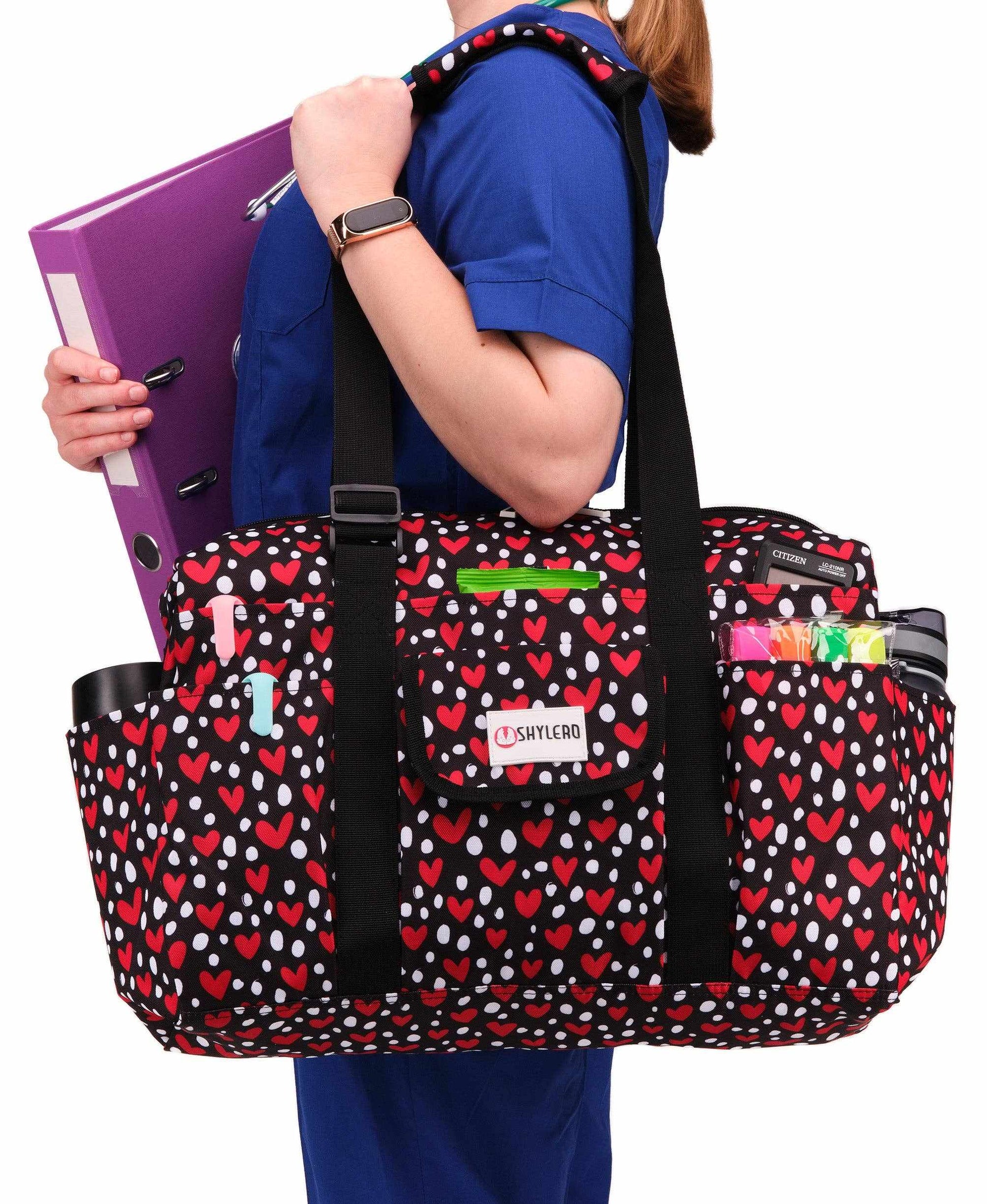 Nurse Bag and Utility Tote | Waterproof | Red HeartsGrab Your Large SHYLERO Utility Bag and Enjoy: 

 * 14 OUTSIDE POCKETS 
 * 7 INSIDE POCKETS 
 * DEDICATED LAPTOP COMPARTMENT (UP TO 17") 
 * LARGE &amp; ROOMY - size