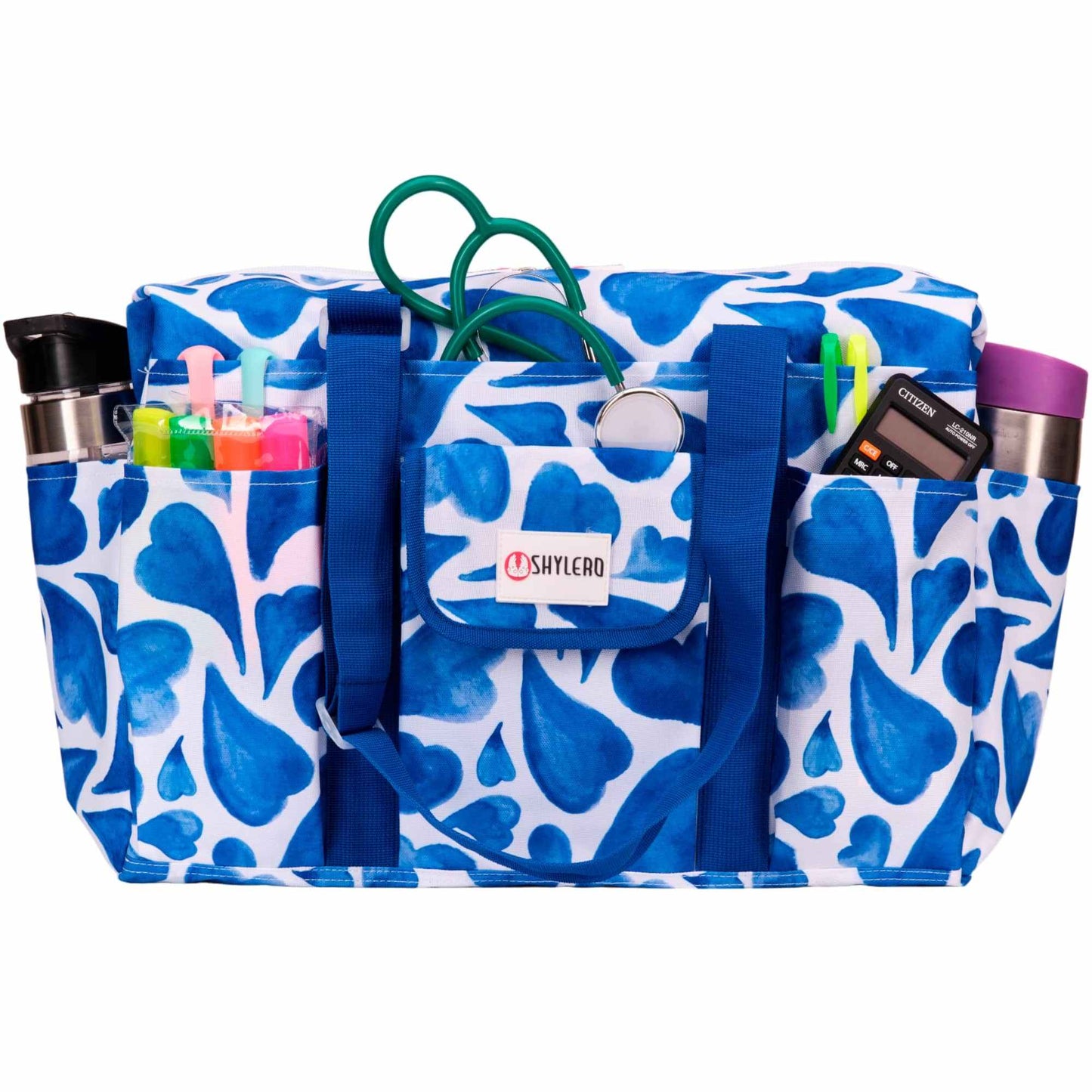 Nurse Bag and Utility Tote | Waterproof | Blue HeartsGrab Your Large SHYLERO Utility Bag and Enjoy: 

 * 14 OUTSIDE POCKETS 
 * 7 INSIDE POCKETS 
 * DEDICATED LAPTOP COMPARTMENT (UP TO 17") 
 * LARGE &amp; ROOMY - sizetoteNurse BagSHYLEROScrub Angel & Accessories 