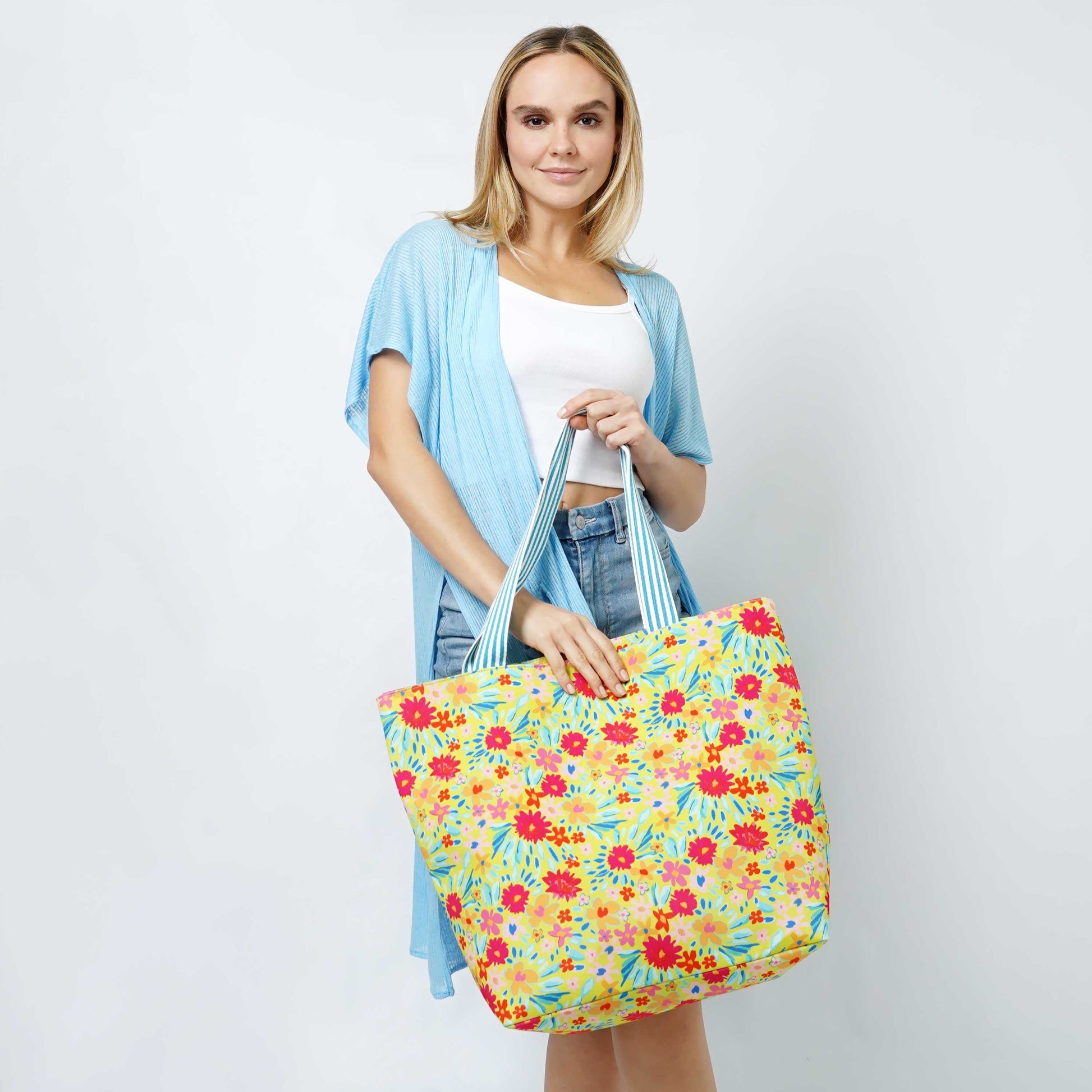 Colorful Floral Print Summer Tote BagFloral Print Tote Bag 

- Zipper Closure
- One Small Zipped Pocket Inside
- Size: 15.25" L x 19" W (5.5" Wide Bottom)
- 100% Polyester

**Light Weight, Perfect for SColorful Floral Print Summer Tote BagFashion CityScrub Angel & Accessories 